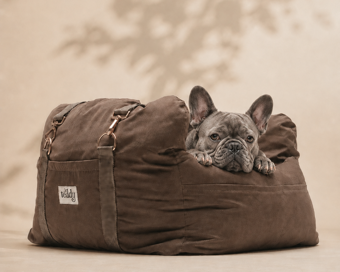 French Bulldog resting in the By Teddy Puffer Dog Car Seat in Chocolate