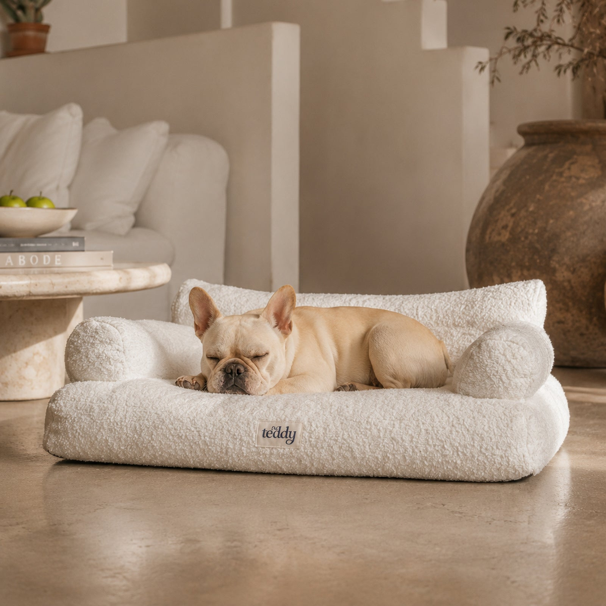 French Bulldog resting on the By Teddy Teddington Dog Sofa Bed in Marshmallow bouclé