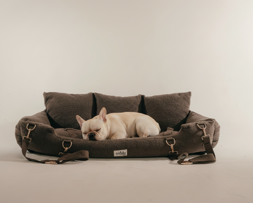 By Teddy XL Cosy Dog Car Seat in Chocolate with a dog lying in the full-width sherpa travel bed