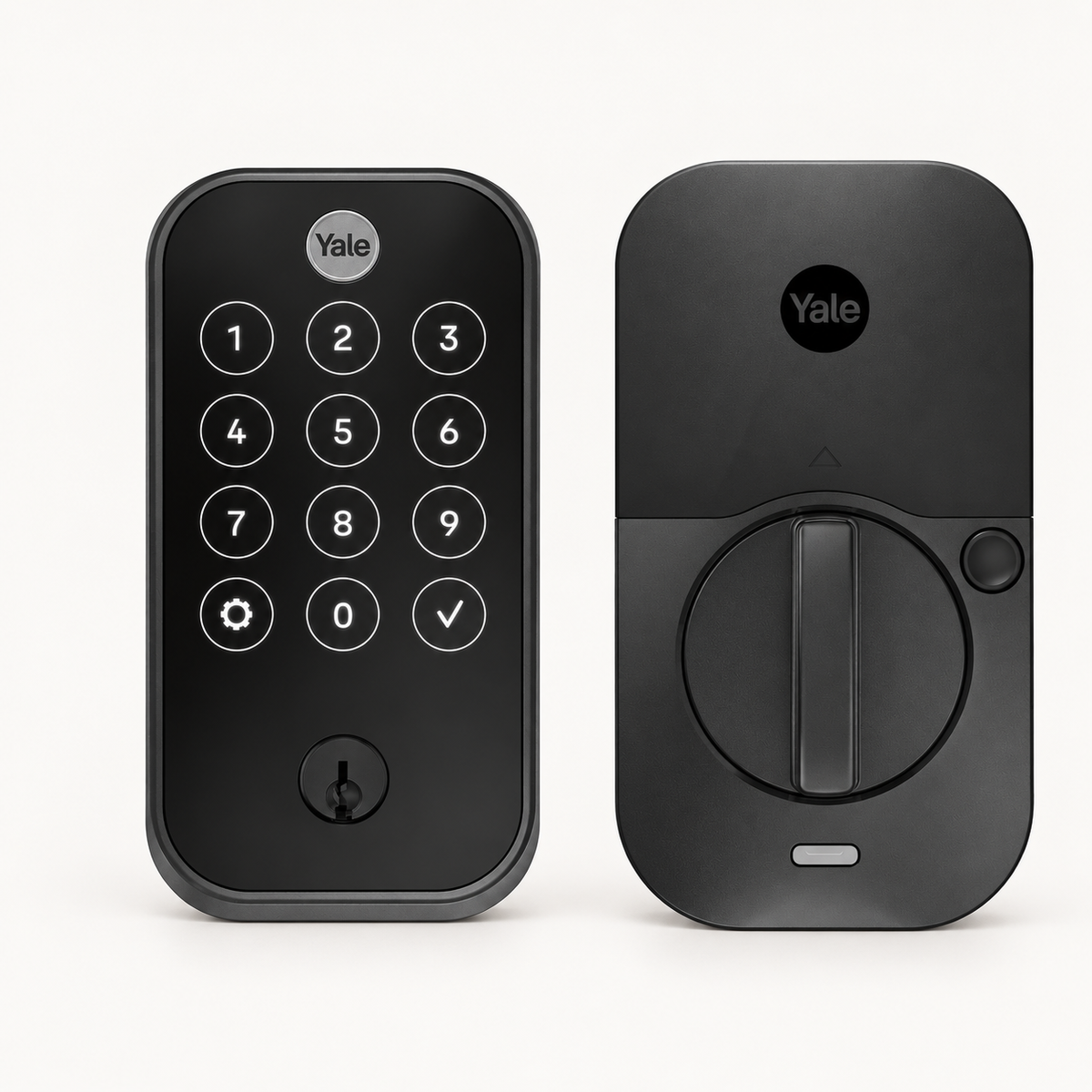 Black Yale Assure Lock 2 Touch exterior keypad and interior thumbturn on a warm white background