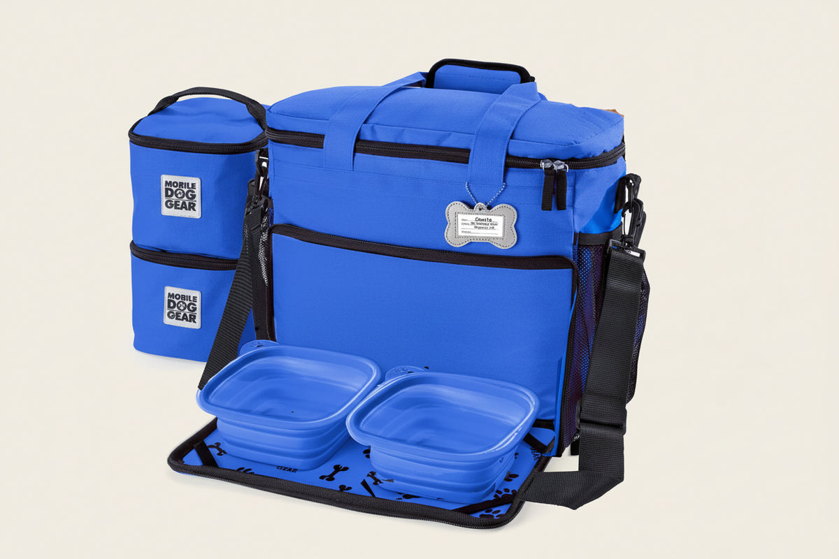 Royal Blue Mobile Dog Gear Week Away tote with two food carriers, bowls and placemat