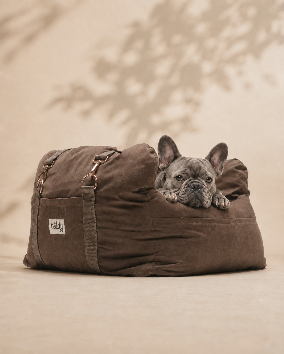 French Bulldog resting in the By Teddy Puffer Dog Car Seat in Chocolate