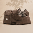 French Bulldog resting in the By Teddy Puffer Dog Car Seat in Chocolate