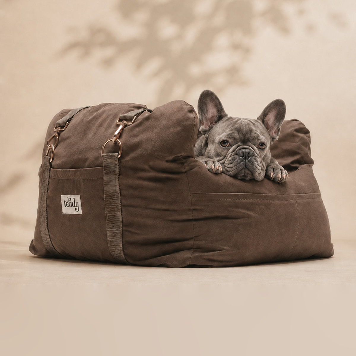 French Bulldog resting in the By Teddy Puffer Dog Car Seat in Chocolate