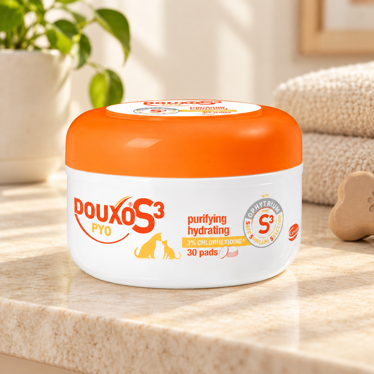 DOUXO S3 PYO pads jar with orange lid on a bathroom counter