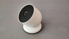 Google Nest Cam battery shown on a tabletop stand