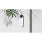 Google Nest Doorbell battery mounted on an exterior wall