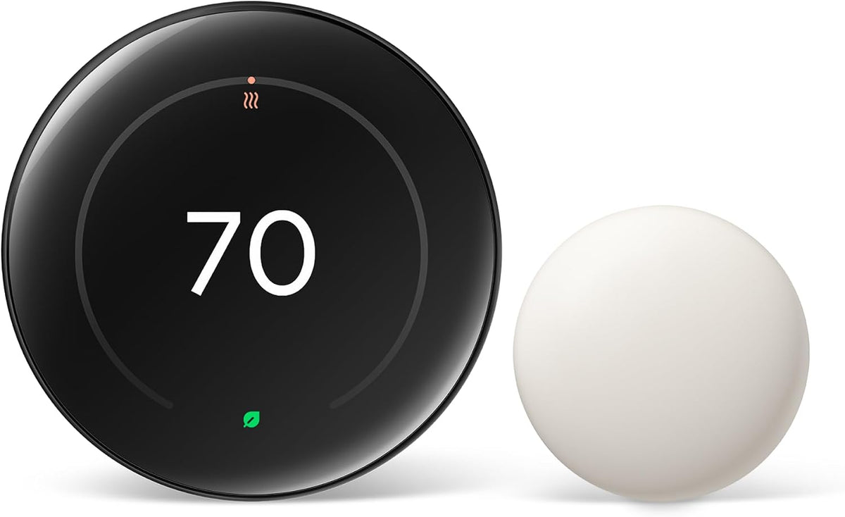 Nest Learning Thermostat in Obsidian with its separate white temperature sensor