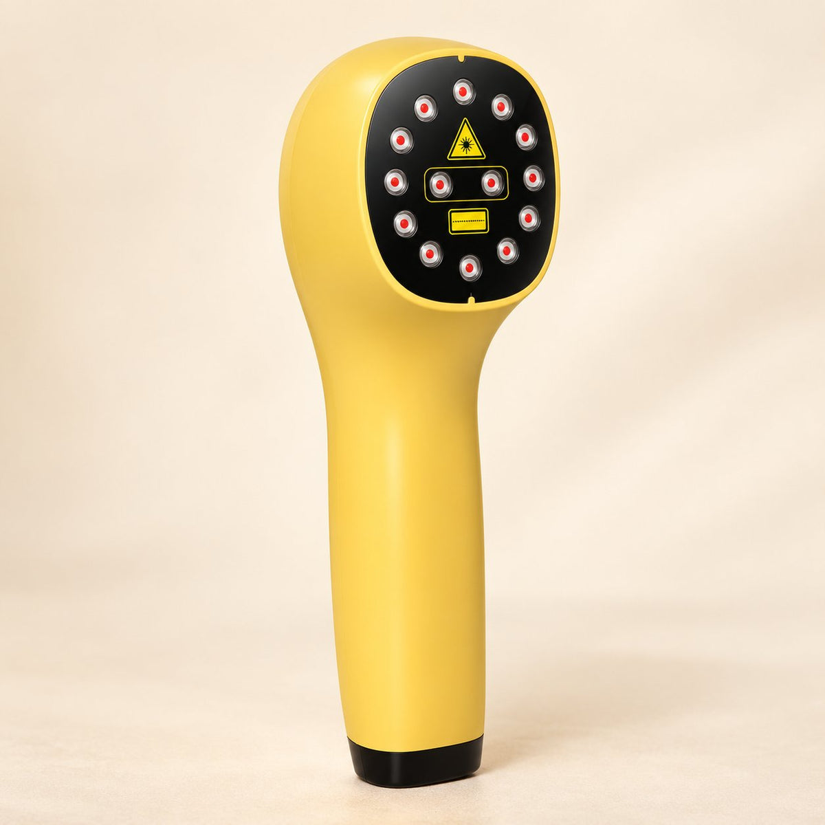 Rear view of the PUPCA handheld device showing its oval emitter face and warning labels.