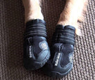Dog wearing Walker Active boots for paw protection